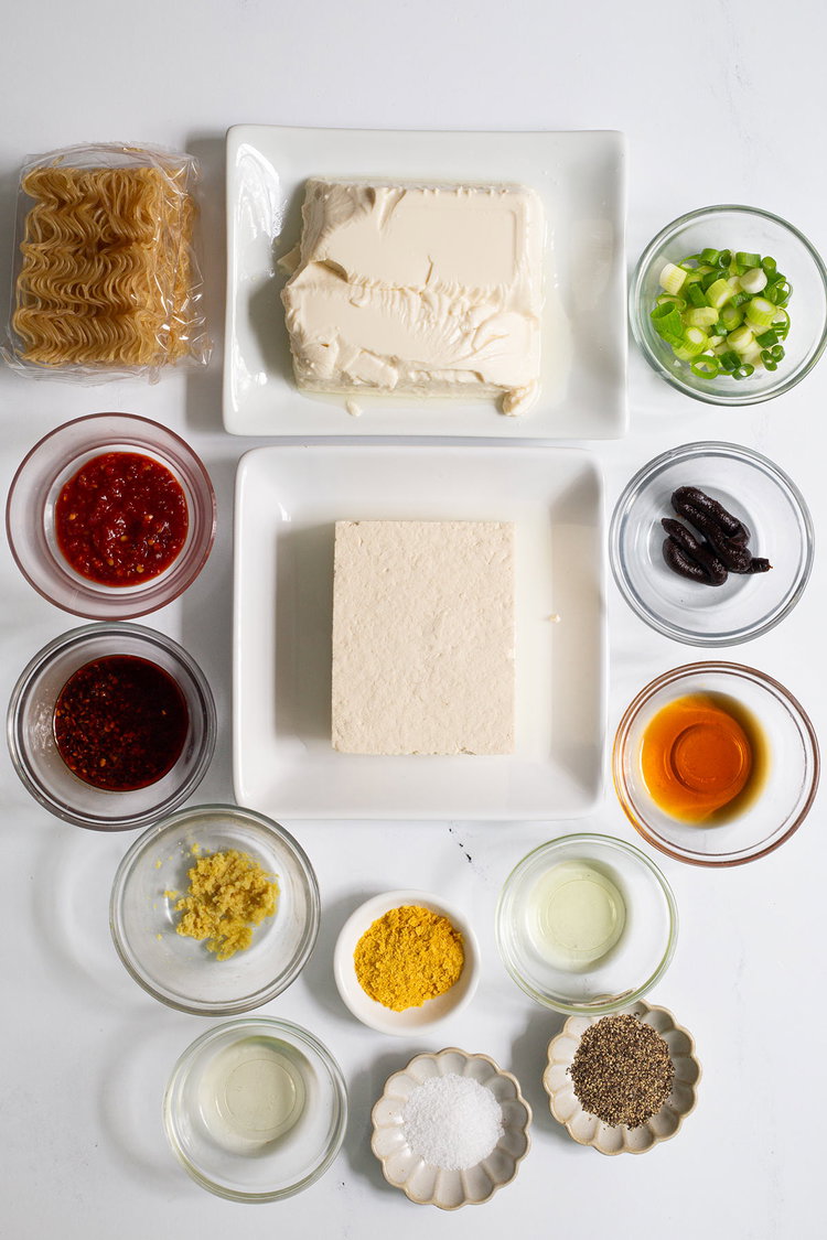Image of Divide the noodles between 4 bowls, top with the silken...