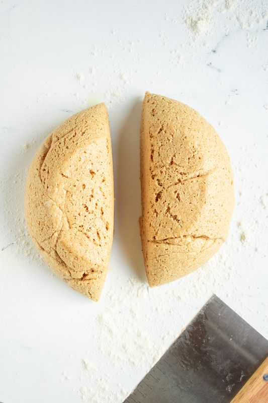 Image of Once the dough has double, place it on a lightly...