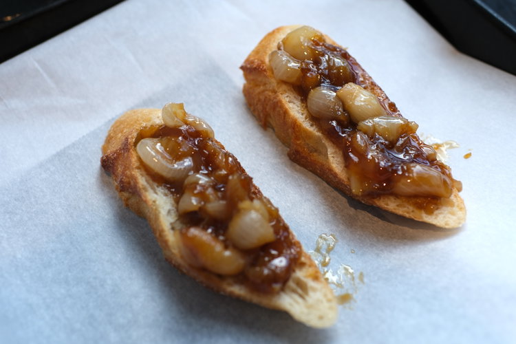 Image of Thinly slice a baguette and layer the slices on a...