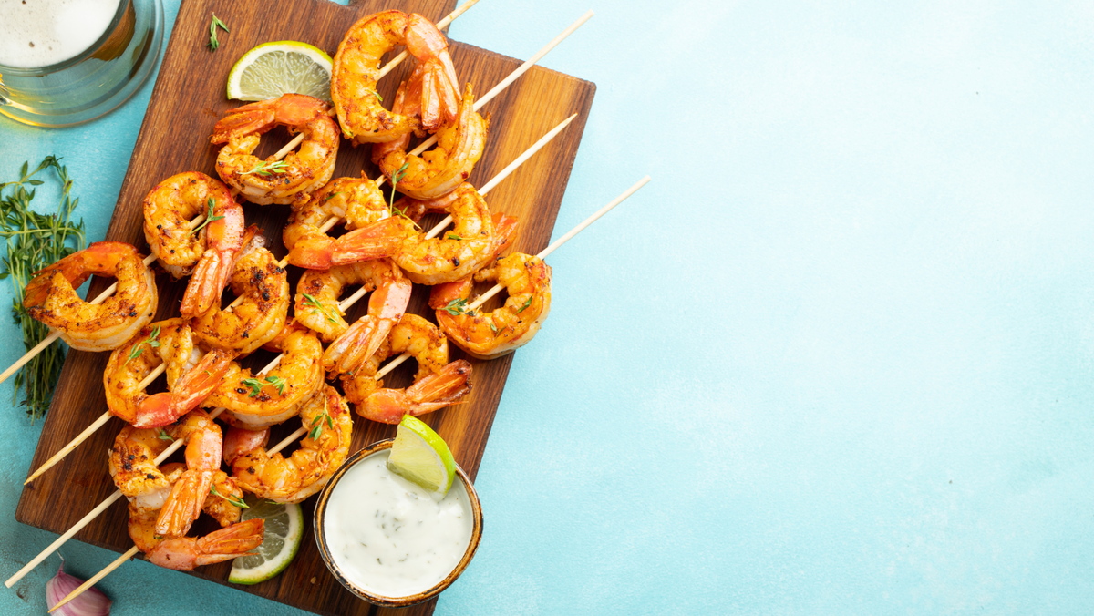 Shrimp Skewers over Esquites (Grilled Street Corn)