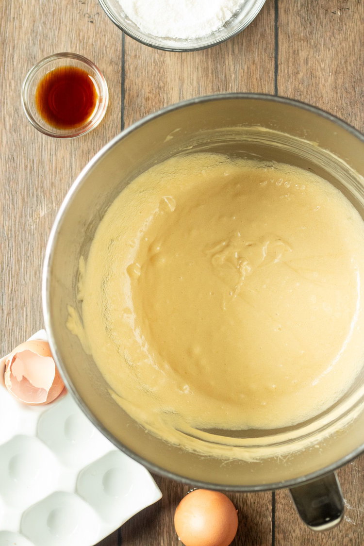 Image of Cream together the butter and sugars until fluffy. 