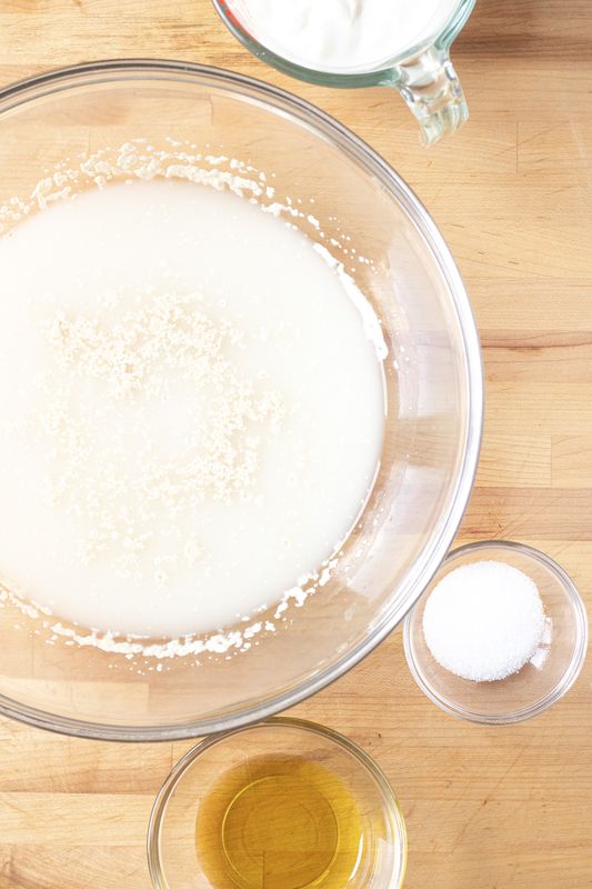 Image of Mix together yeast, water and sugar in a large bowl....