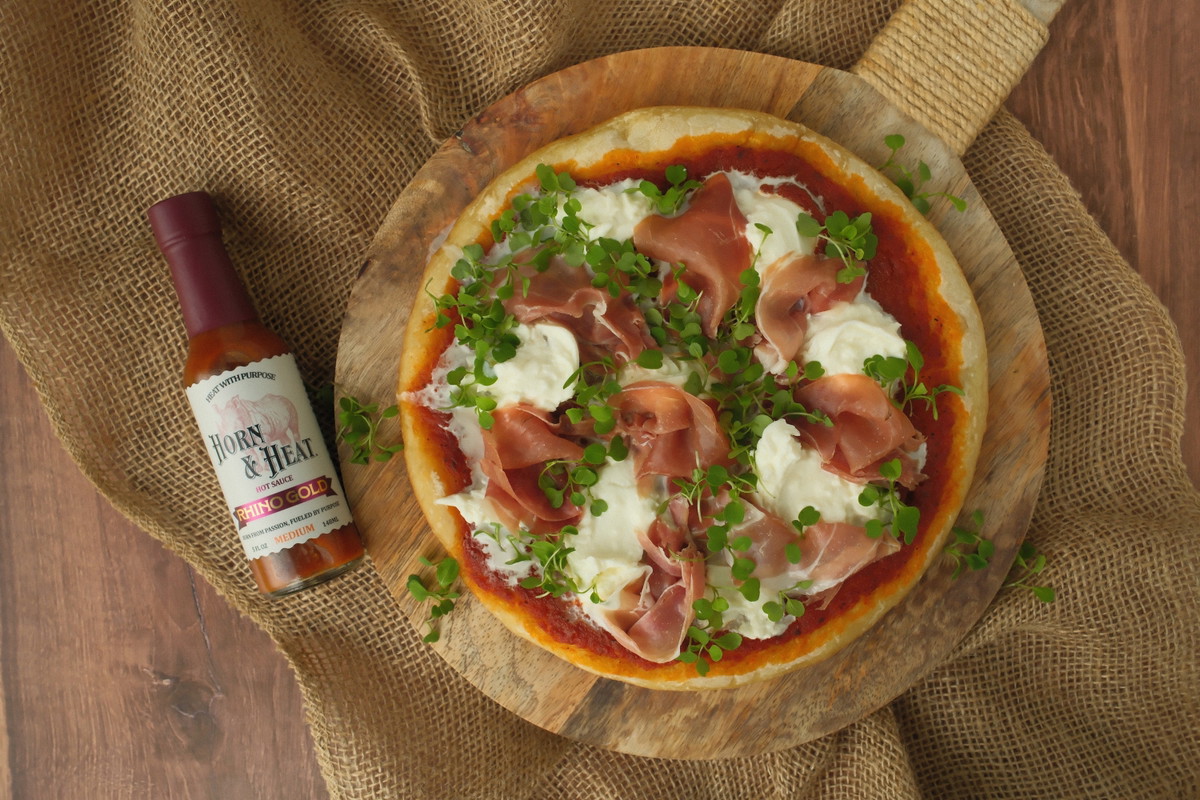 Horn & Heat Prosciutto & Burrata Pizza with Rhino Gold Sauce