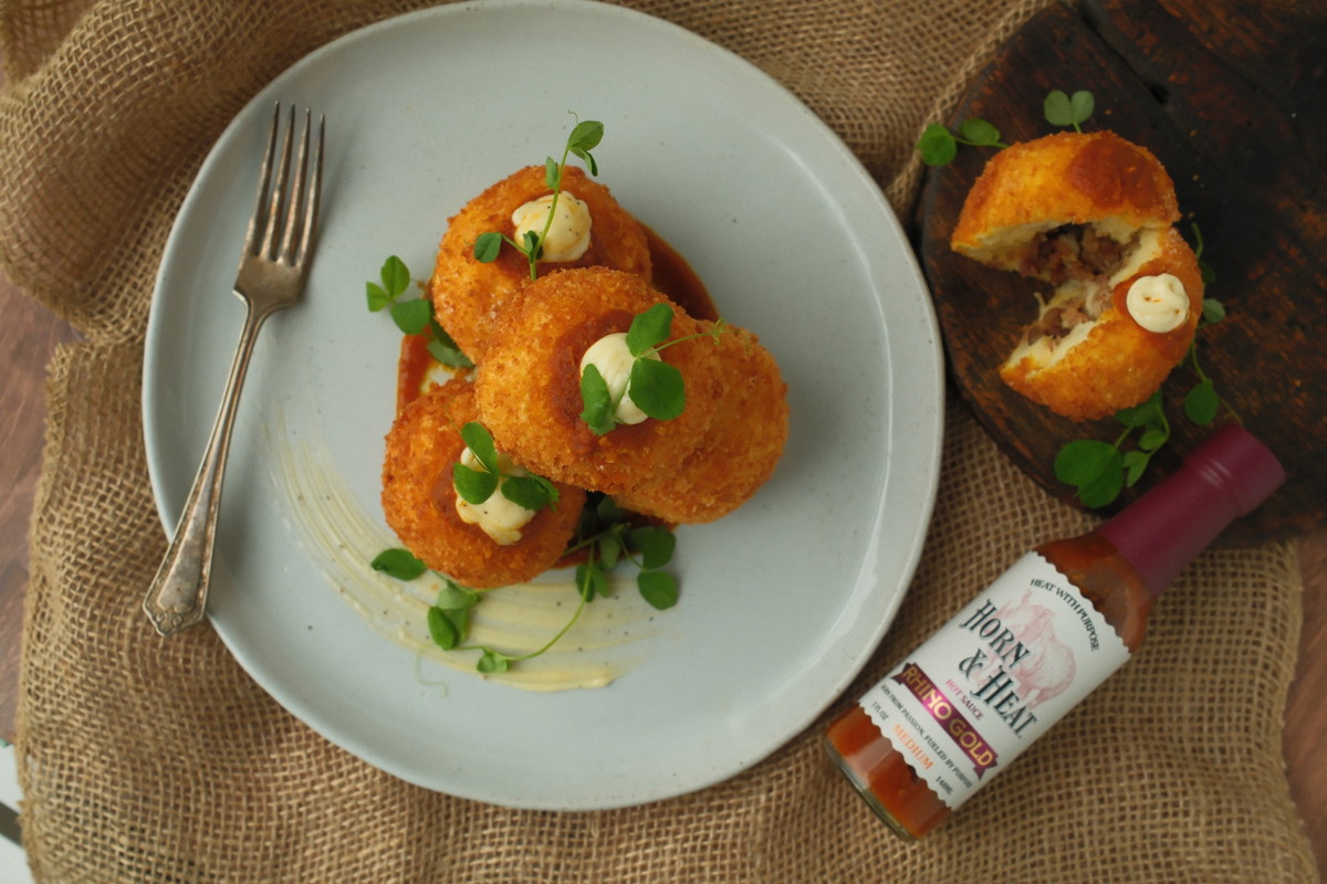 Horn & Heat Spanish Bombas with Rhino Gold Hot Sauce