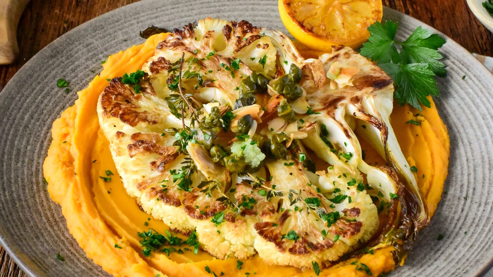 Image of Golden Cauliflower Steaks with Whipped Sweet Potatoes, and Rustic Caper-Almond Gremolata