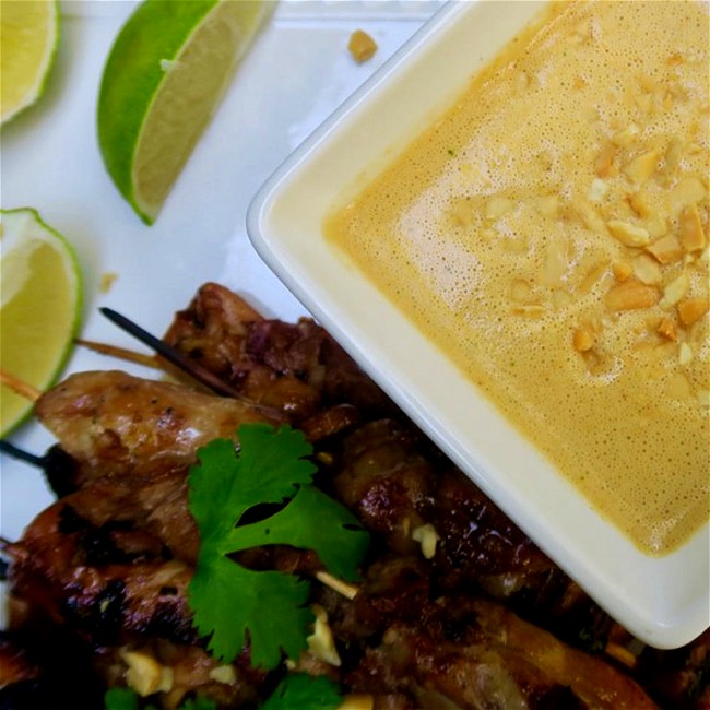 Image of chicken thighs with peanut garlic dipping sauce
