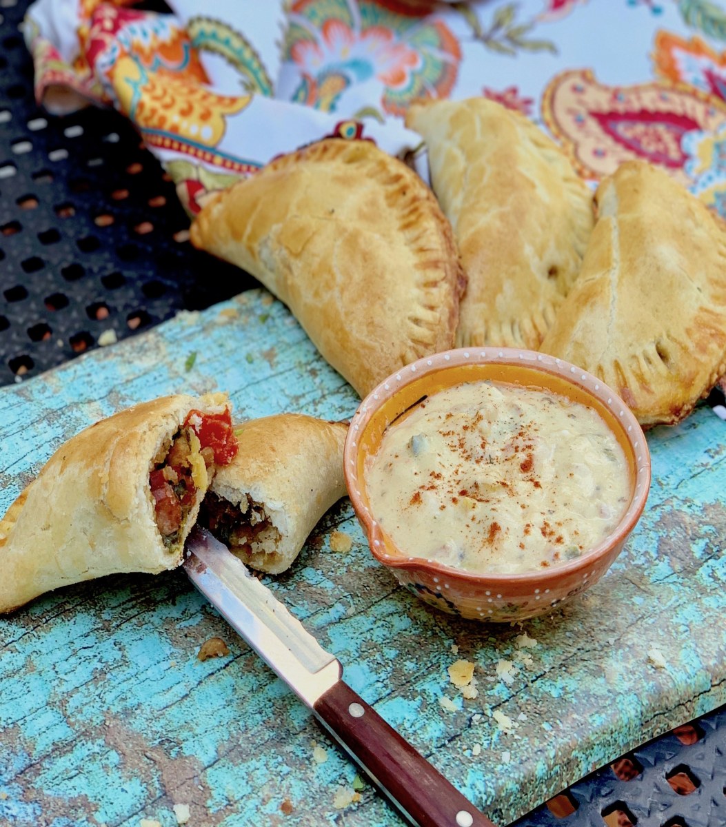 Sausage, Peppers & Onion Empanadas with Pale Ale Beer Sauce