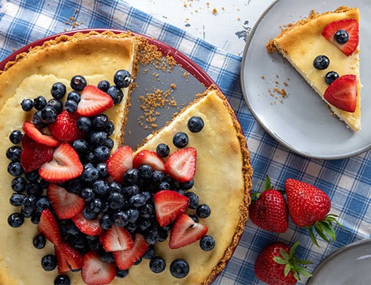 Image of All American Strawberry, Banana and Blueberry Cheesecake