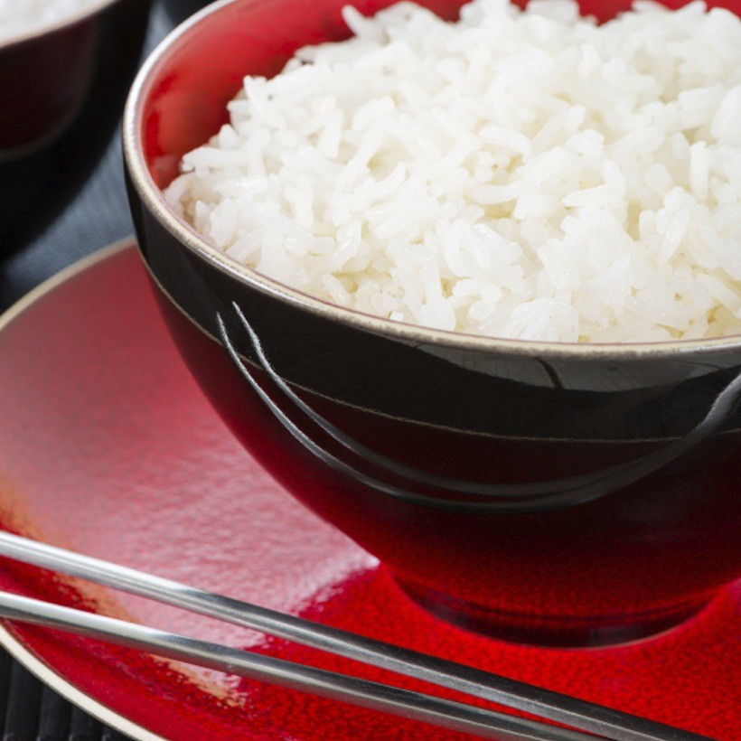 White Long Grain Rice In An American Metal Cup Measure Stock Photo
