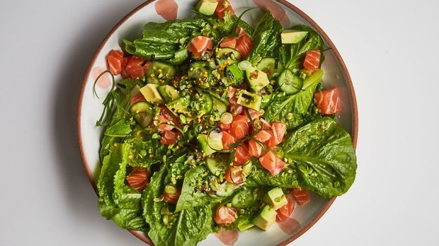 Image of Salmon Poke on Greens with Wasabi Peas