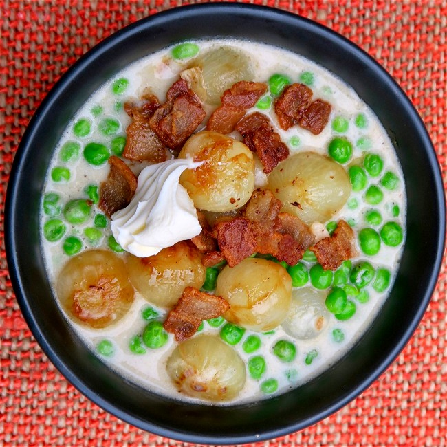 Image of creamed peas with onions & bacon in béchamel sauce