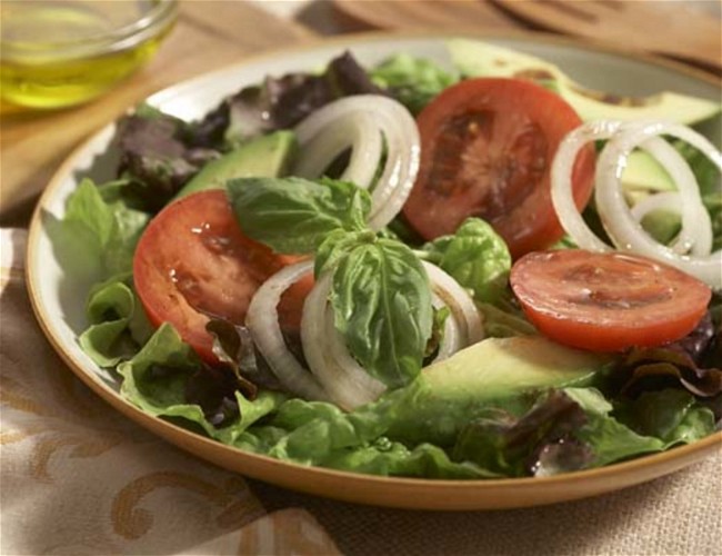 Image of Avocado, Maui Onion and Organic Tomato Salad with a Basil Vinaigrette