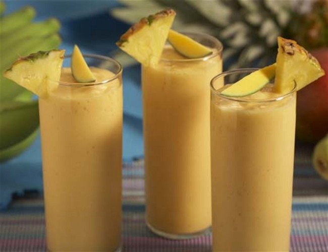 Image of Pineapple, Strawberry Papaya, and Manzano Banana Batido