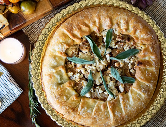 Image of Brown Butter Pumpkin Galette with Caramelized Onions, Goat Cheese and Sage