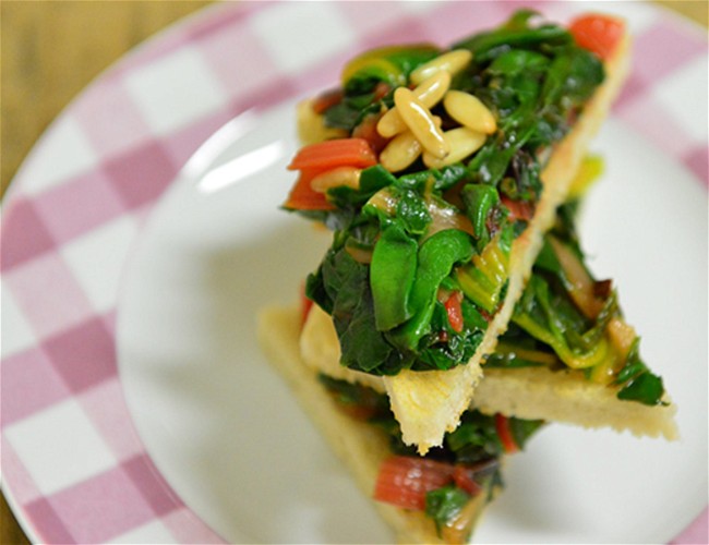 Image of Bruschetta with Swiss Chard, Pine Nuts and Currants