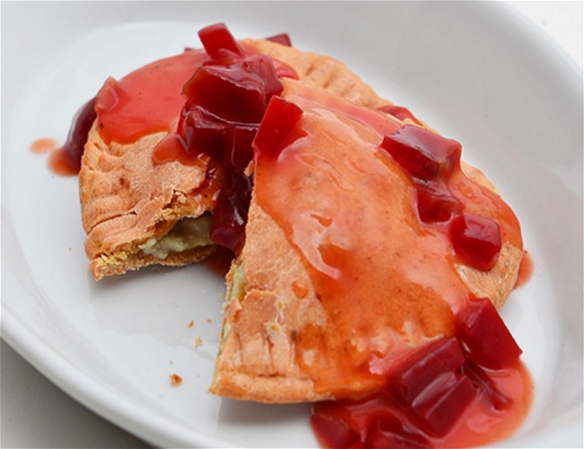 Image of Cheese Filled Beet Raviolis with Orange Beet Sauce