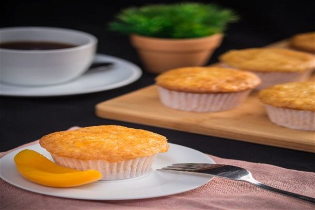 Image of Turmeric Peach Sunrise Muffins Recipe