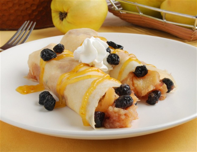 Image of Quince Butter Filled Crepes with Pixie Tangerine Sauce