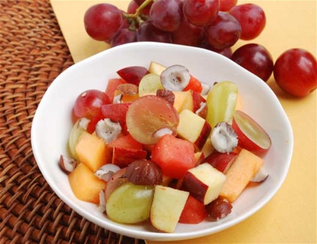 Image of Coquito Topped Fruit Salad