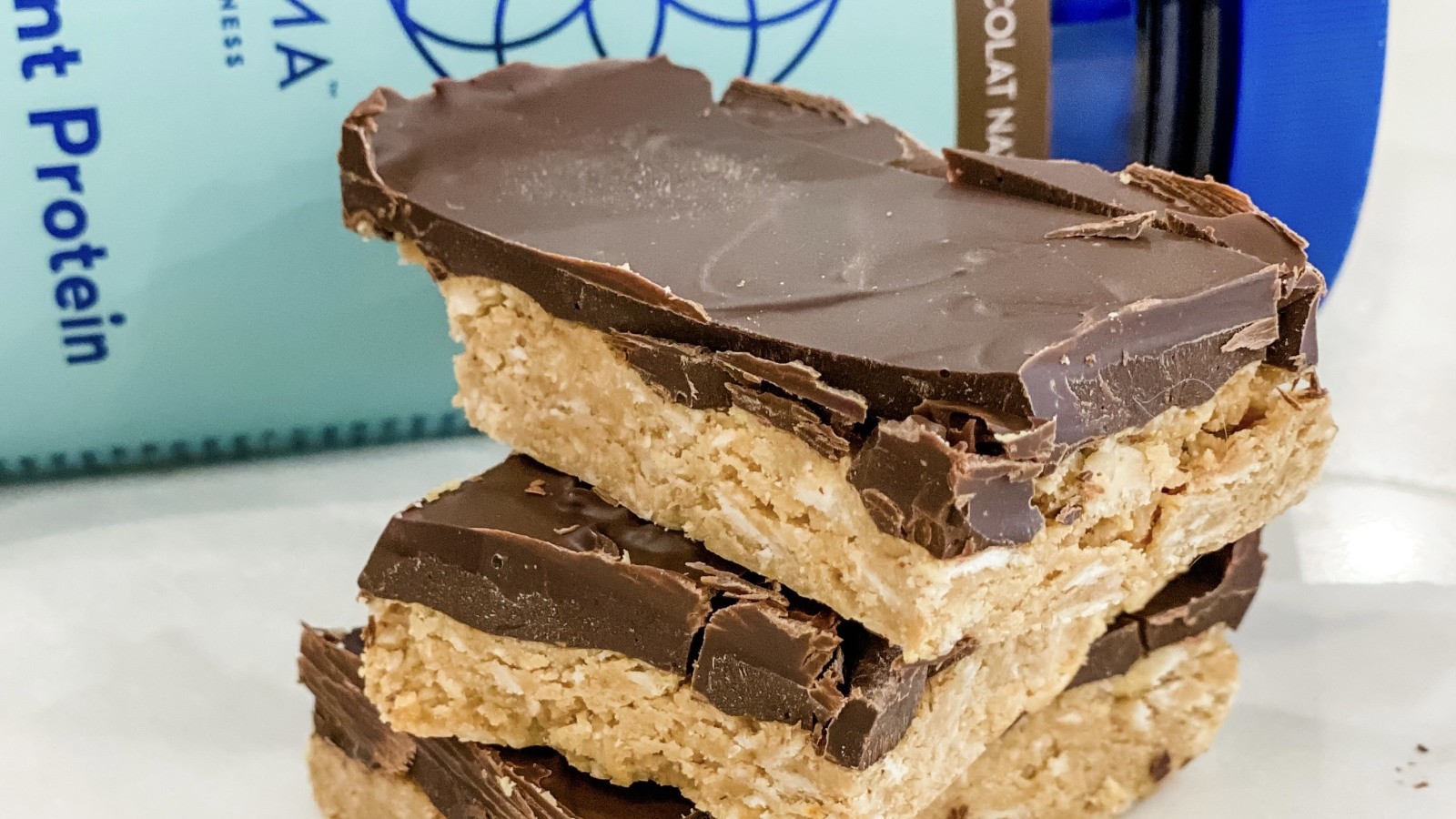 Image of Chocolate Peanut Butter Protein Bars - 7 ingredients no-bake