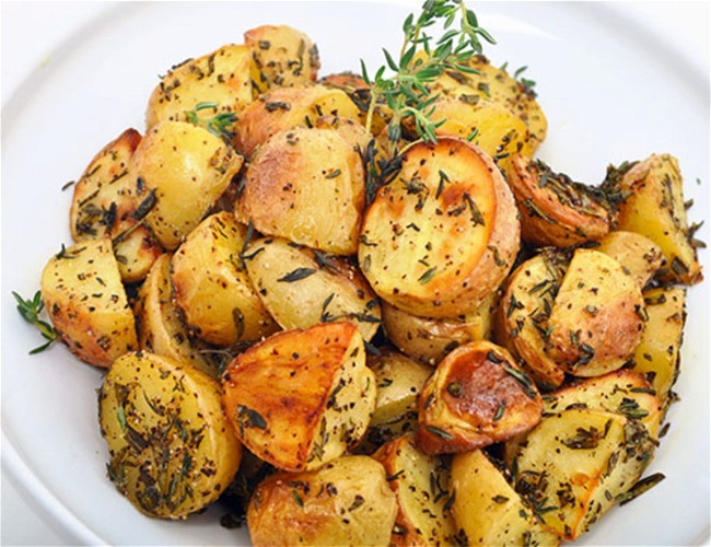 Image of Roasted Baby Dutch Yellow® Potatoes with Fresh Herbs