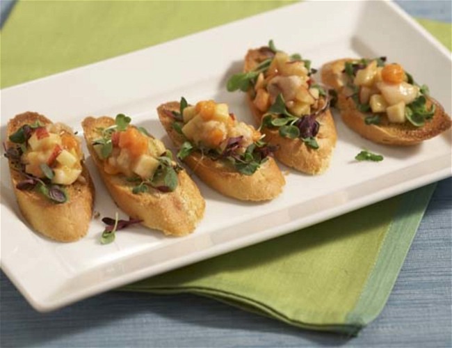 Image of Crostini Topped with Tropical Fruit Salad