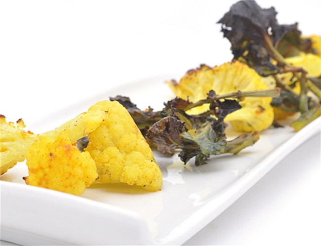 Image of Roasted Kale Sprouts and Cauliflower with Hatch Chile and Fresh Turmeric