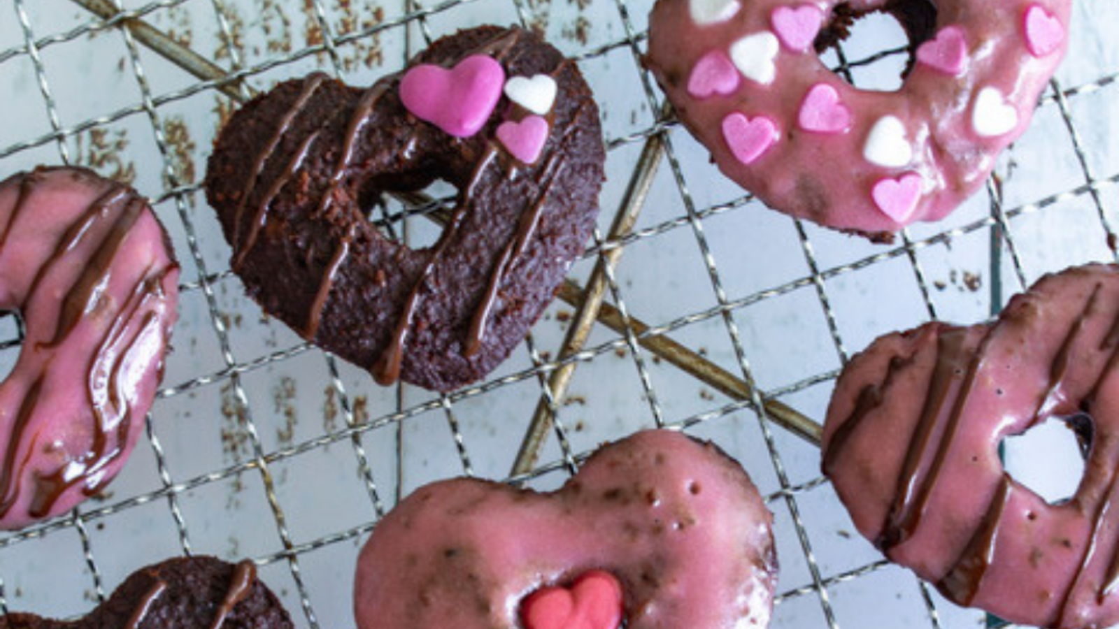 Image of Choc Protein Donuts with Strawberry and Cream Frosting
