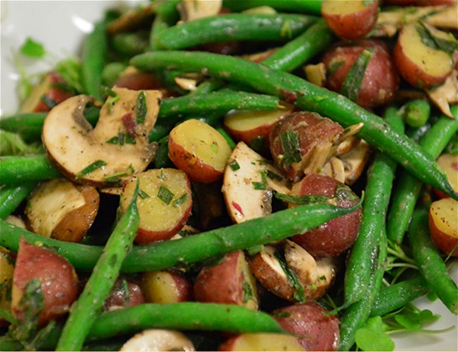 Image of Dutch Red® Potato and Green Bean Salad on Microgreens 