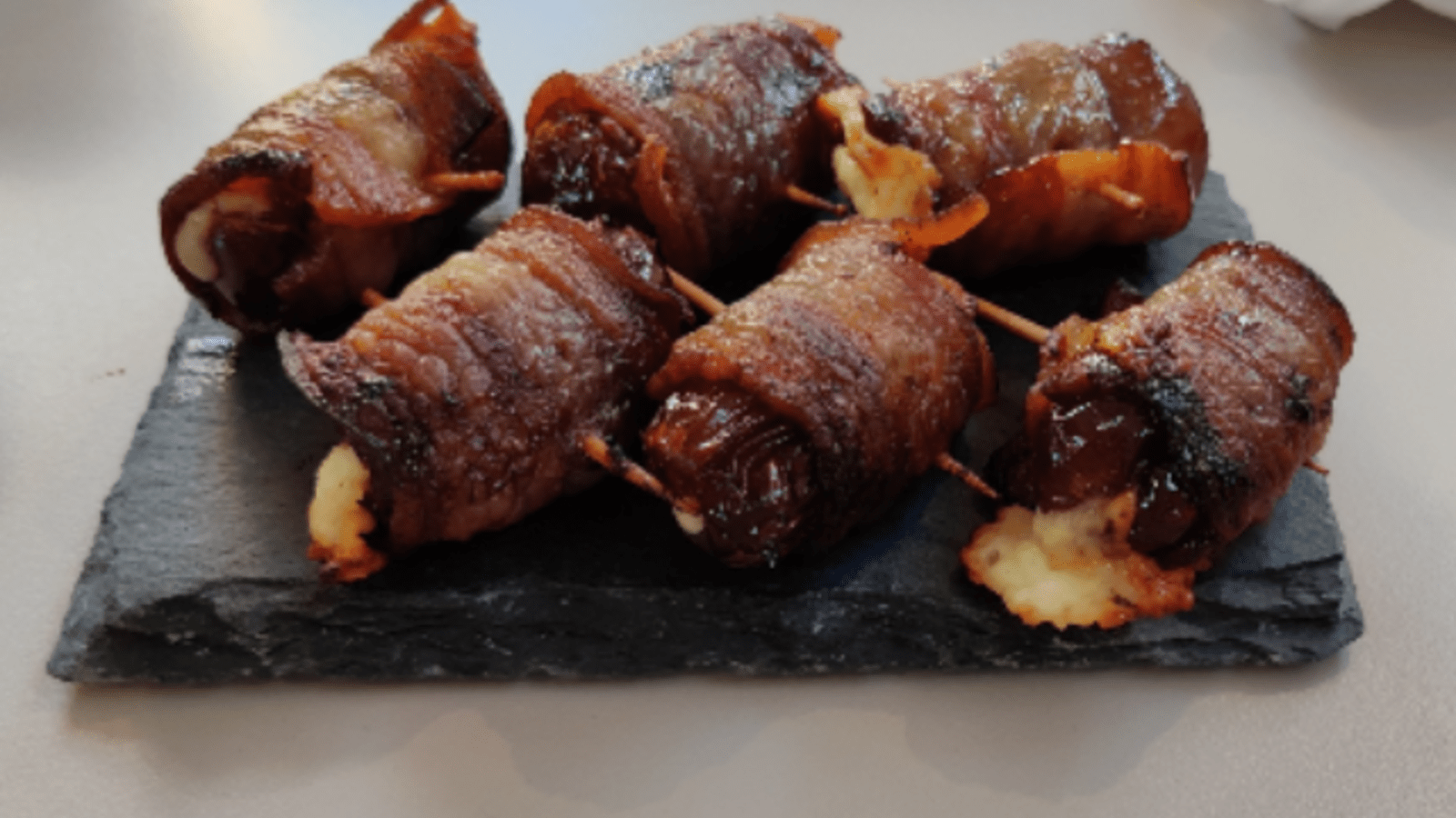 Image of Bacon Wrapped Dates with Manchego Cheese