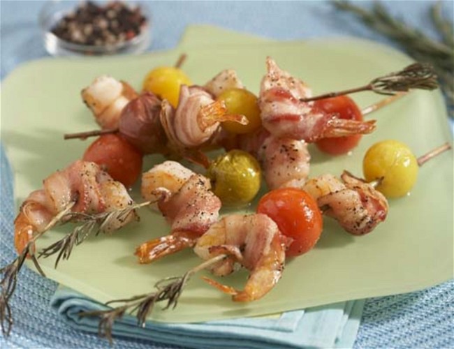 Image of Rosemary Skewered Bacon Wrapped Shrimp with Baby Heirloom Tomatoes
