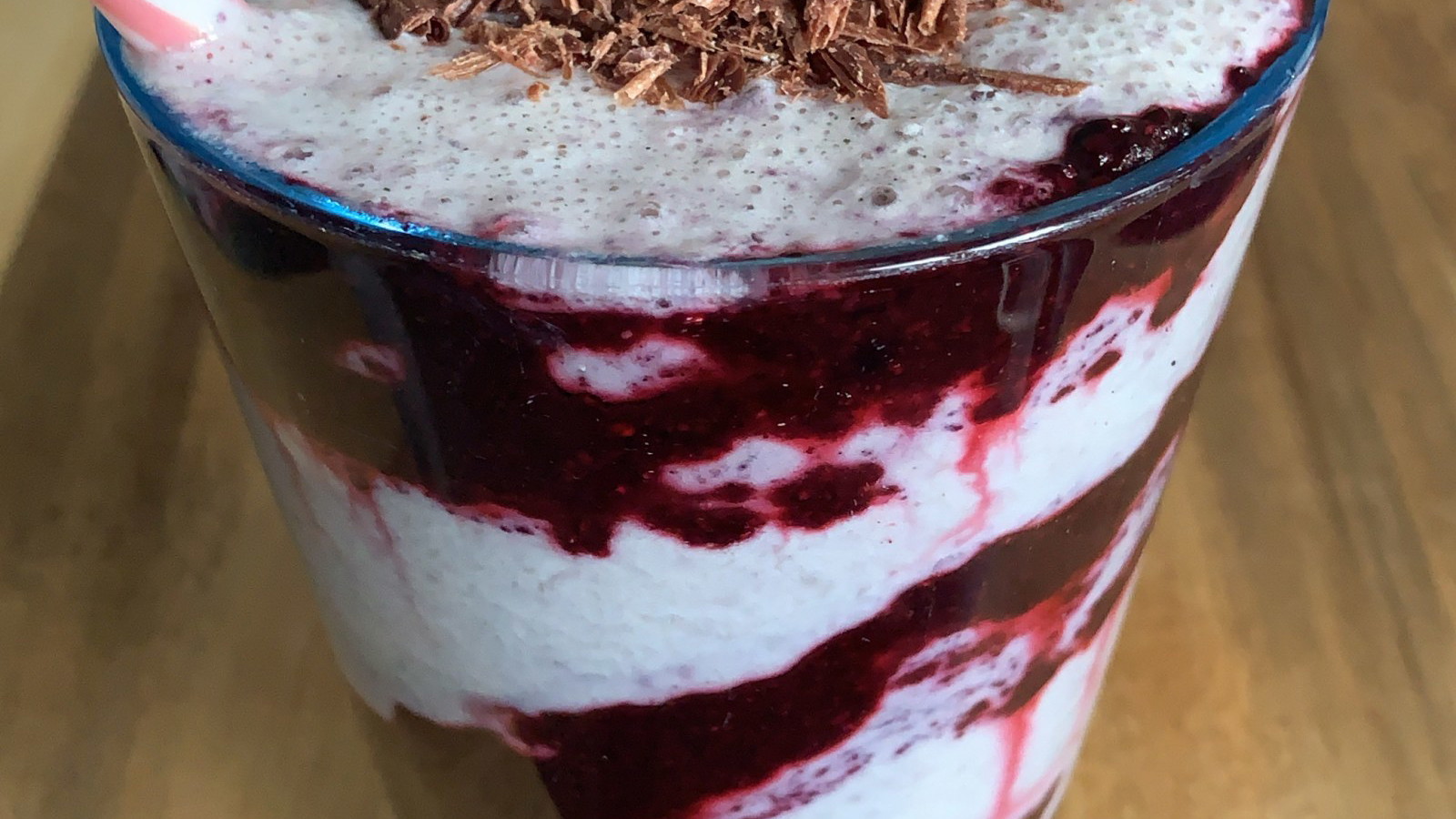 Top with raw chocolate flakes for an extra special shake