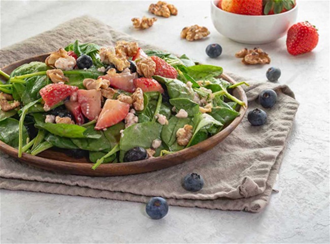 Image of Tropical Spinach Salad with Strawberry Balsamic Vinaigrette