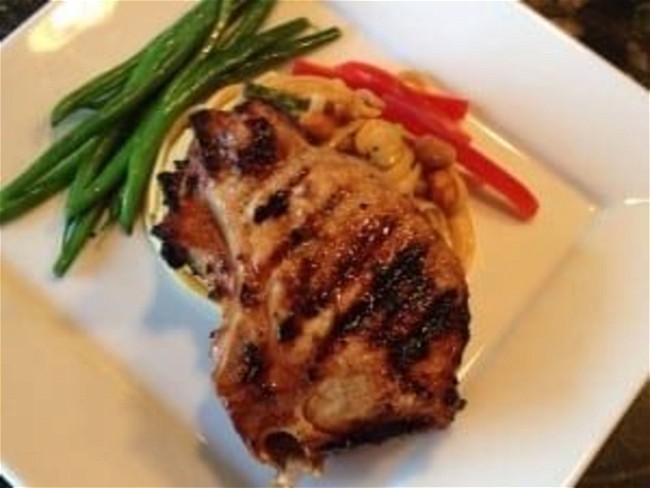 Image of Grilled Asian Pork Chop with Peanut Sauce