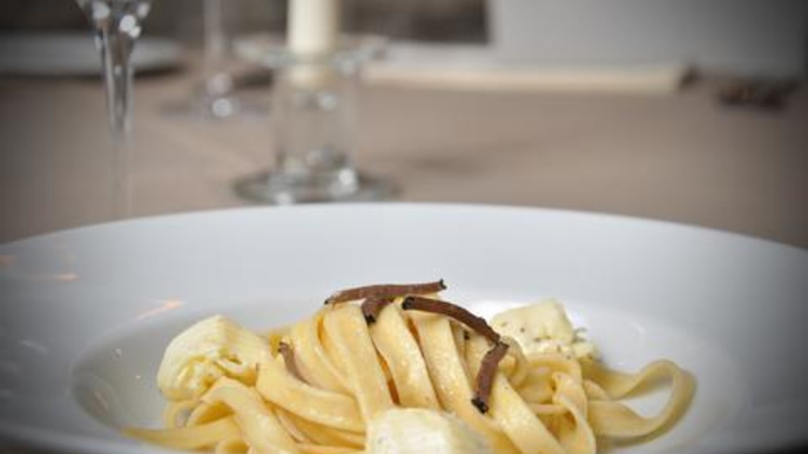 Image of TAGLIATELLE WITH WHITE TRUFFLE BUTTER & BLACK TRUFFLE