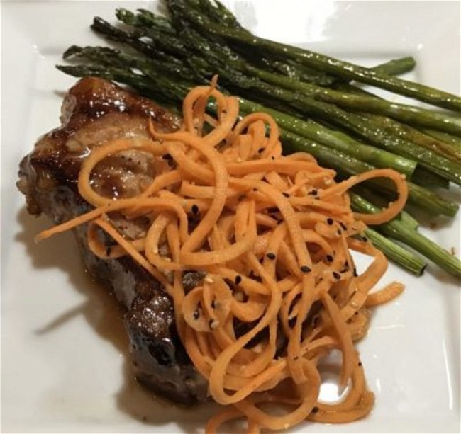 Image of Sesame Carrot Salad Over Teriyaki Pork