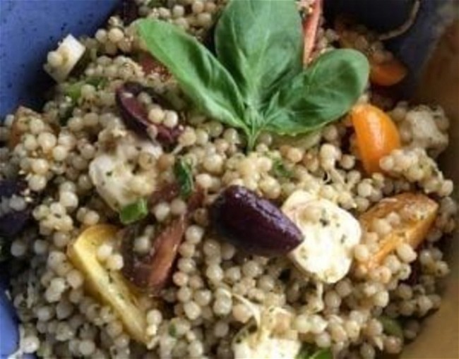 Image of Pesto Couscous Salad with Mozzarella & Tomatoes