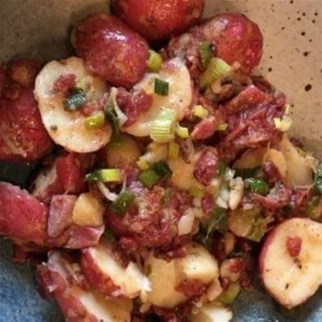 Image of Warm, Roasted Baby Potato Salad with Crispy Bacon, Caramelized Red Onions and Warm Bacon Vinaigrette