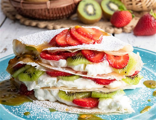Image of Strawberry and Kiwi Crepes with Passion Fruit Sauce