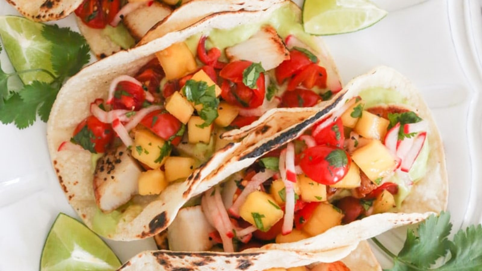 Image of Seared Scallop Tacos with Spring Mango Salsa and Avocado Cream