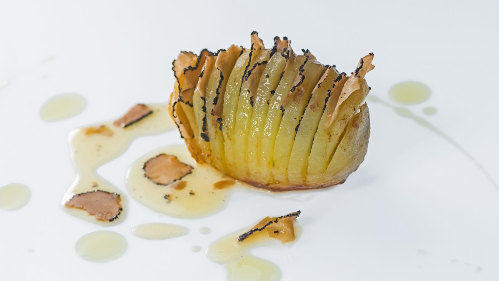 Image of OVEN ROASTED POTATOES WITH CHOPPED BLACK TRUFFLES