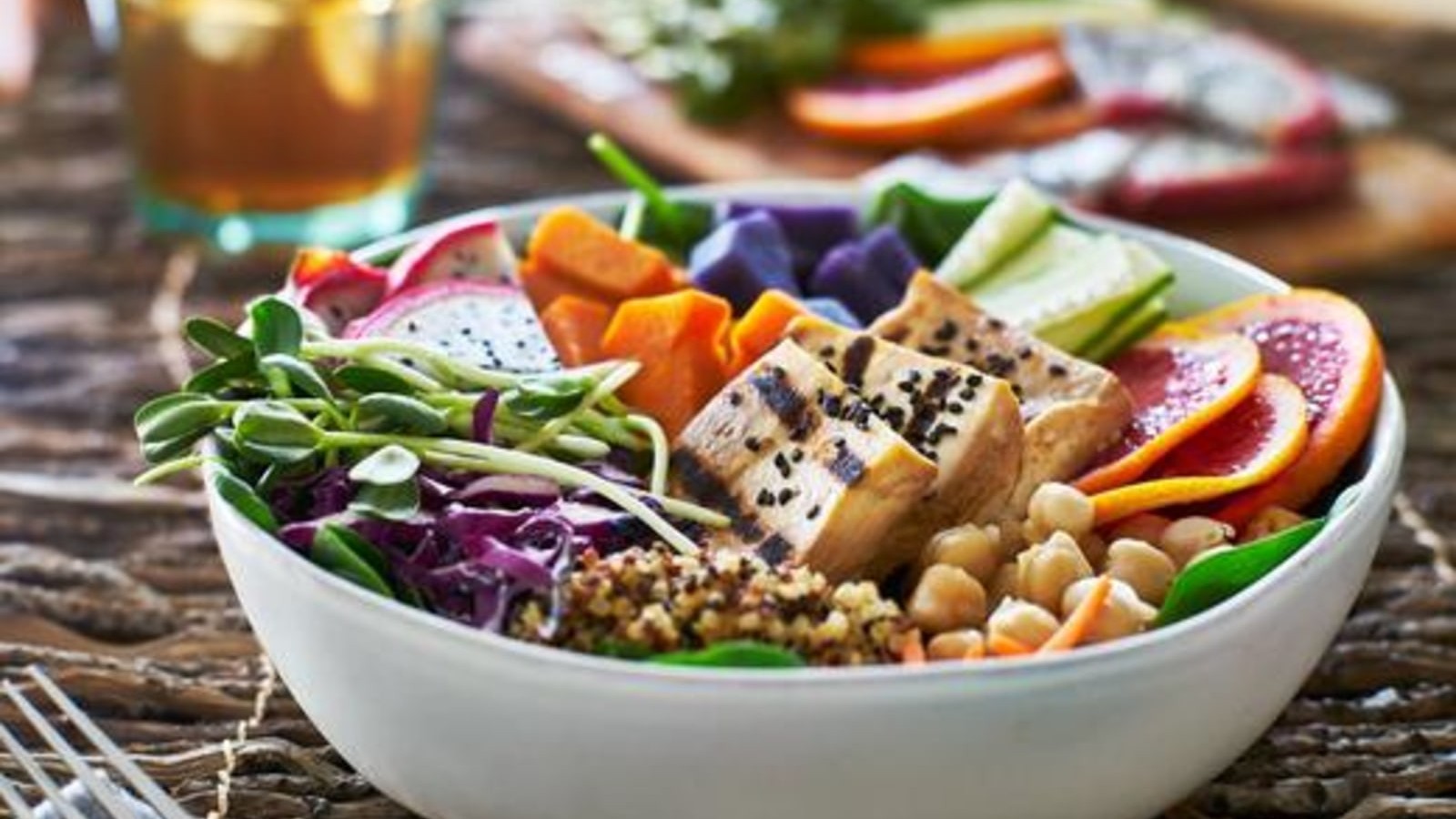 Image of Vegan Buddha Bowl: Tofu Quinoa Bowl with Roasted Vegetables