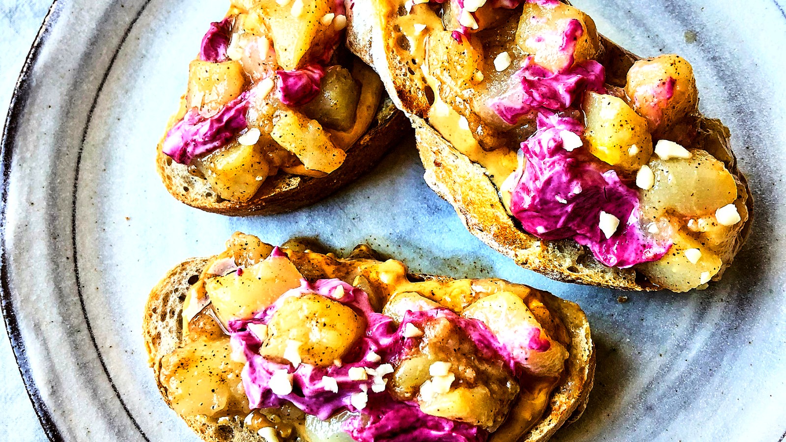 Image of Peanut butter toasts with warm pears and berry swirl yogurt