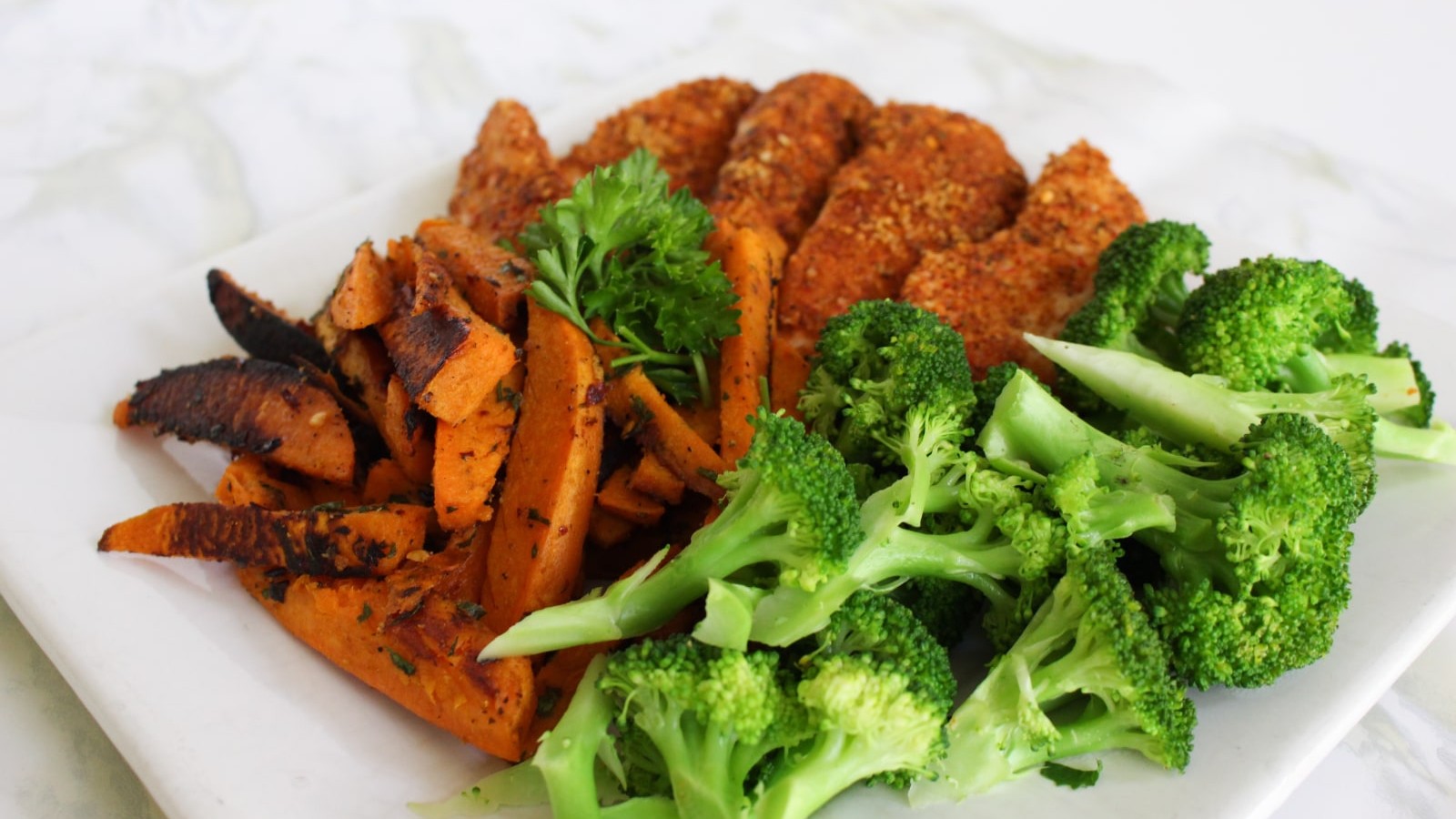 Image of Cajun Chicken with Sweet Potato Fries and Steamed Broccoli