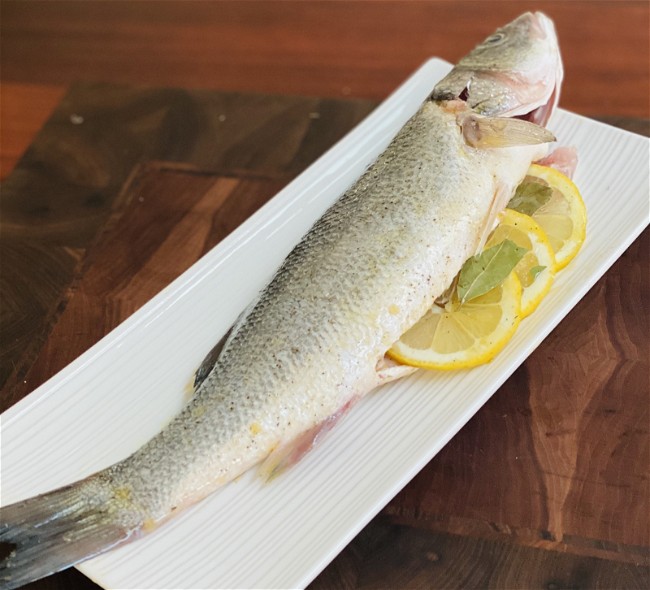 Image of Grilled Whole Branzino (aka Sea Bass aka Loup de Mer) on the BBQ