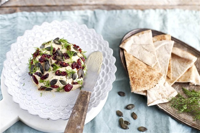 Image of Vegan Cheese Ball with Dill, Cranberries and Pumpkin Seeds