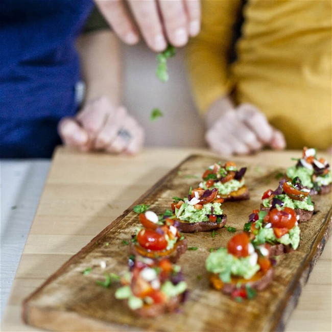 Image of Sweet Potato Bites with Guacamole and Almond Salsa