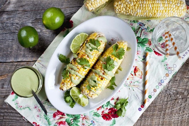 Image of Grilled Corn on the Cob with Creamy Walnut-Basil Sauce