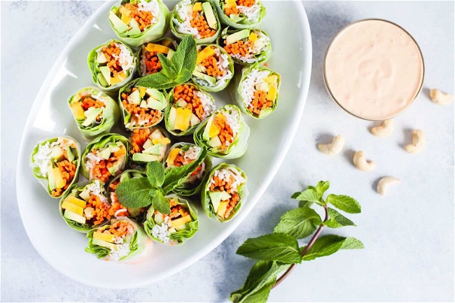 Image of Mango-Avocado Spring Rolls with Spicy Cashew Sauce