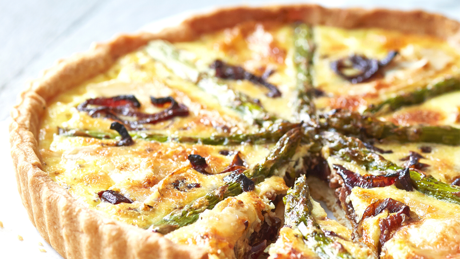 Image of Caramelized-onion and asparagus quiche